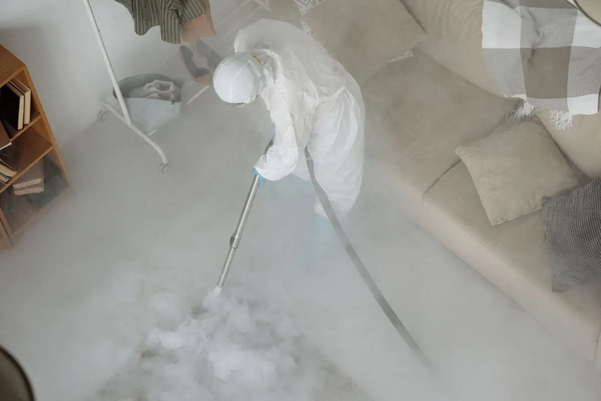 Biohazard cleanup technician in protective equipment, New Salem, PA